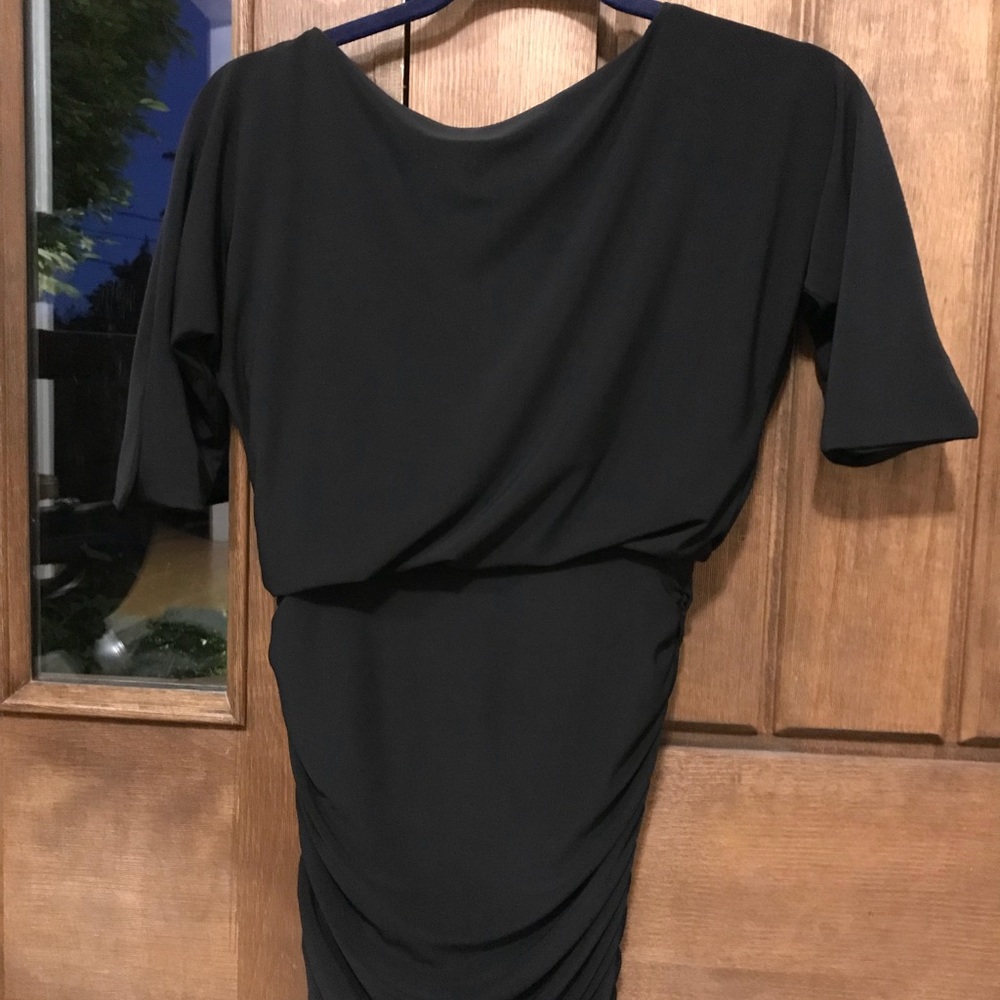 Hollyworld black dress. Boat neck, ruched bottom